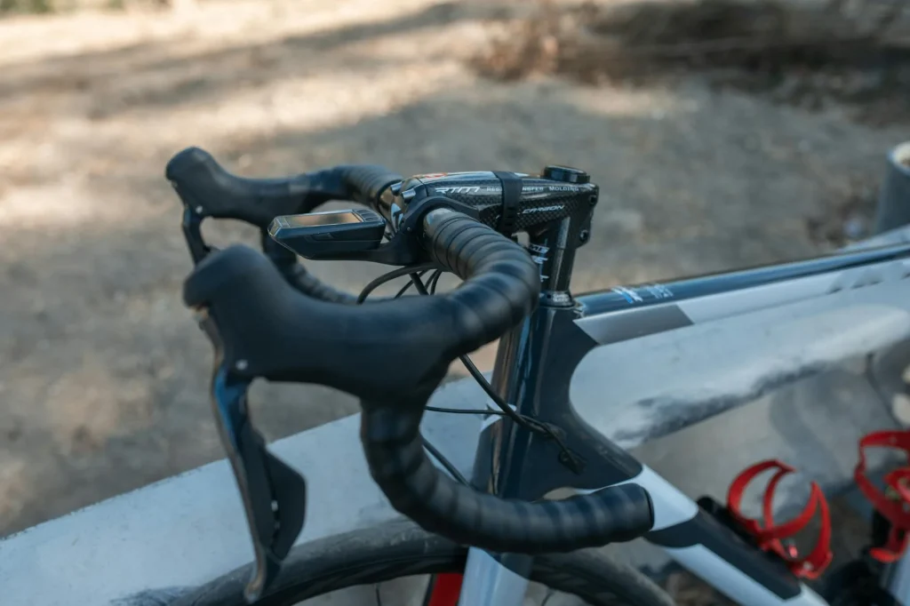 Action camera mounted on e-bike handlebars for dashcam recording
