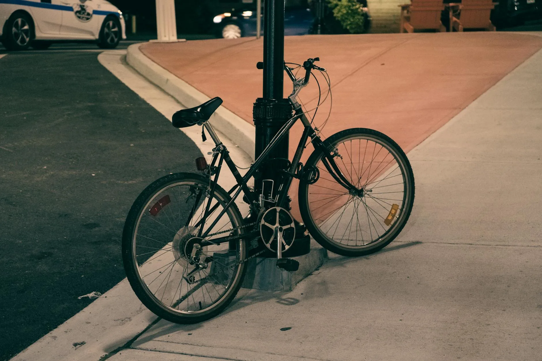 Bicycle secured with a lock and chain for theft prevention