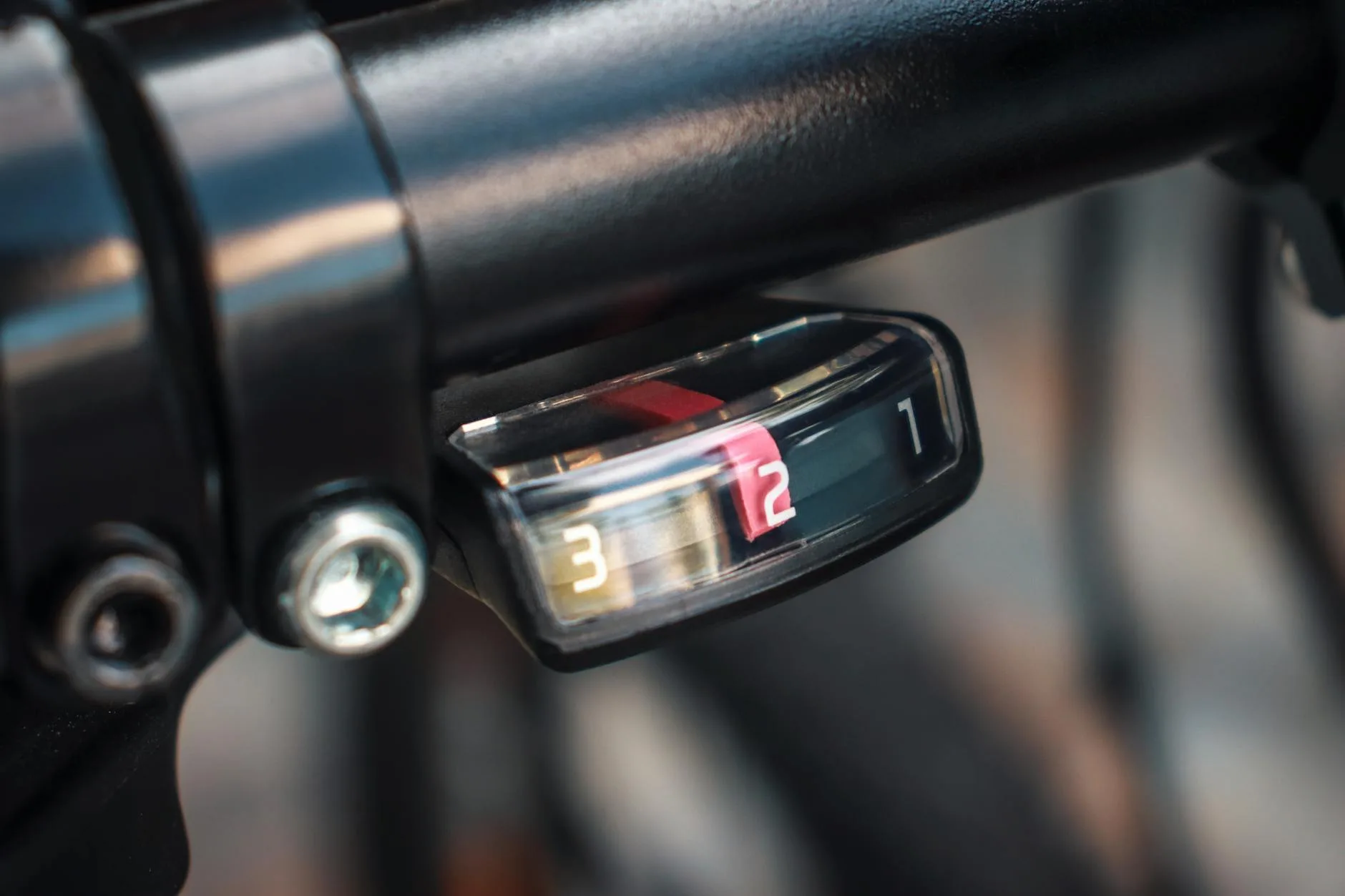 E-bike handlebar with LCD display screen showing ride data
