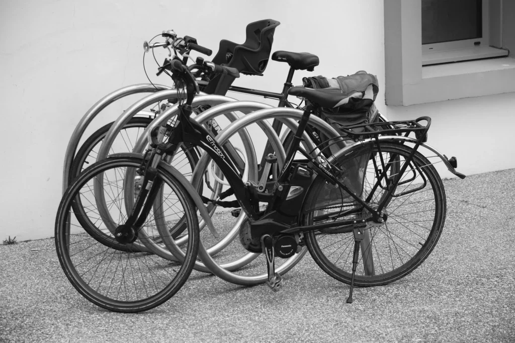 Electric bike locked securely to a rack in an urban street