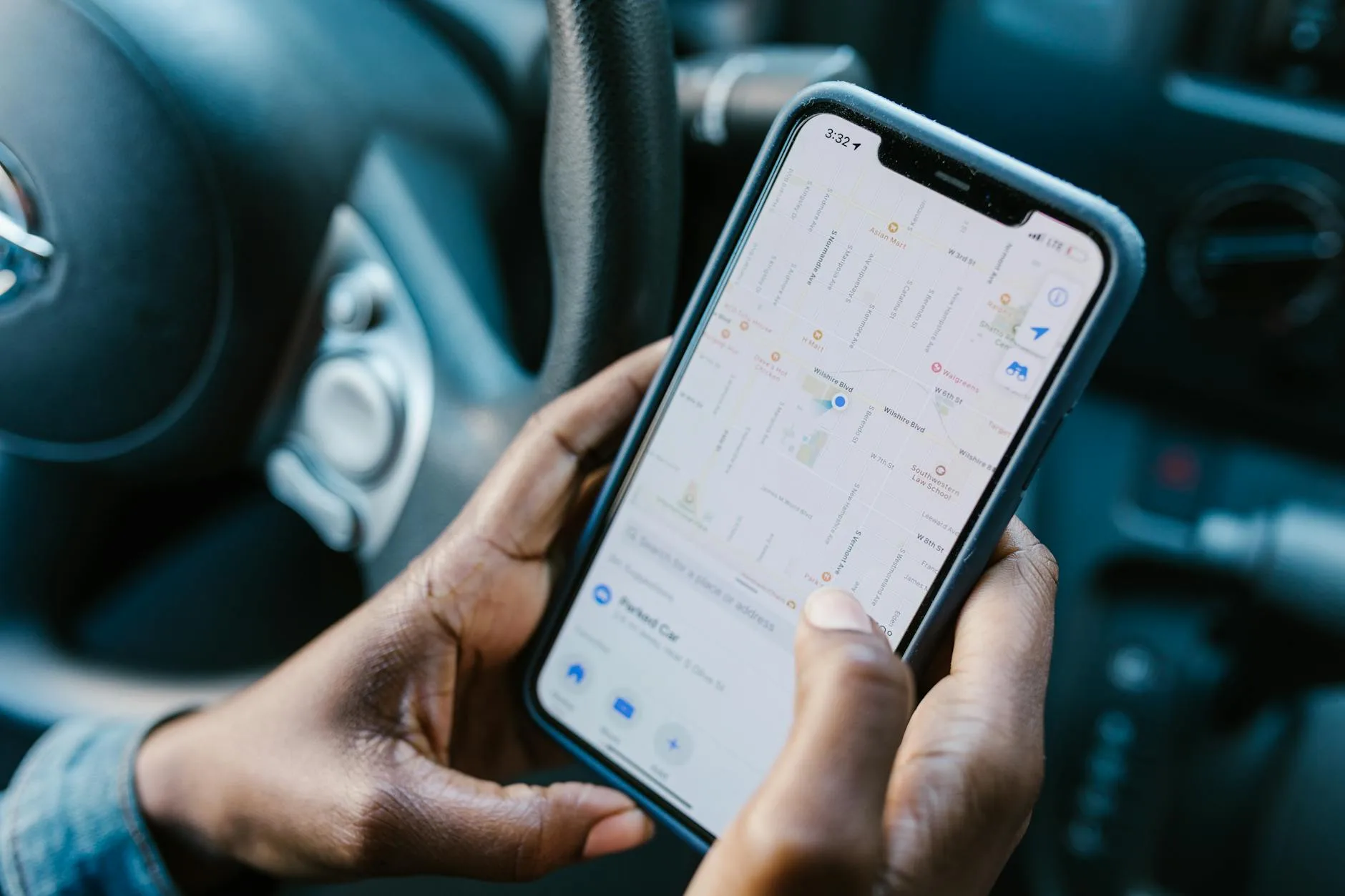 Smartphone showing a GPS tracking map with location pin