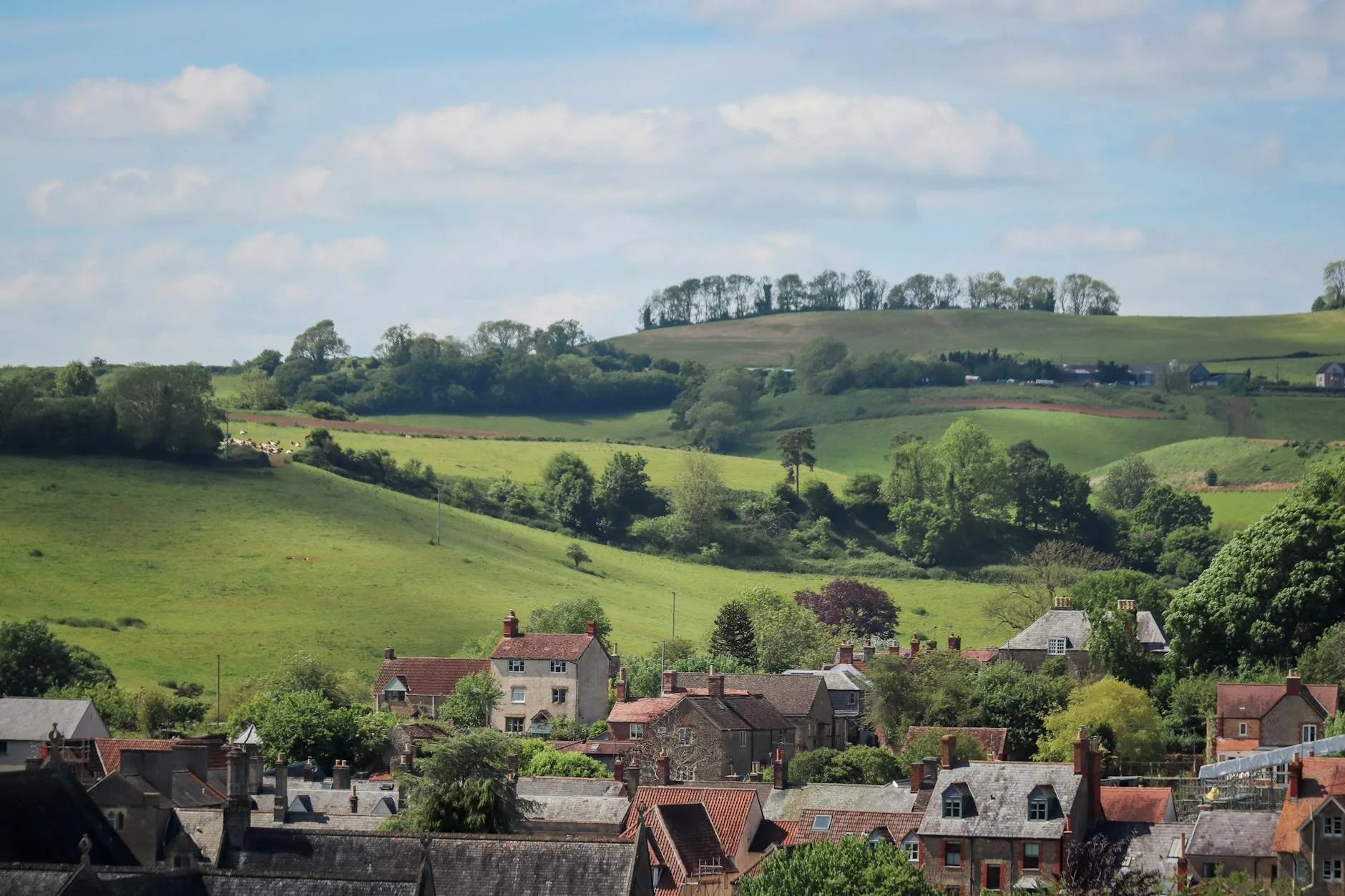 English countryside with rolling hills and a village