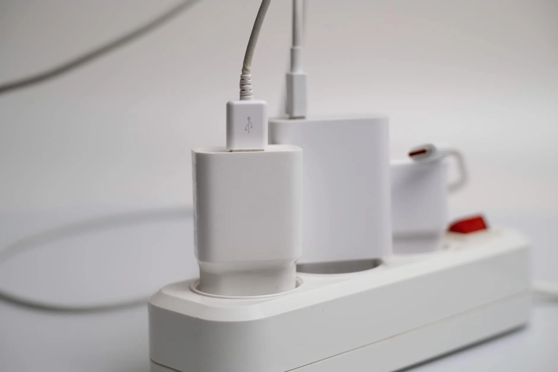 Smart plug in a wall socket for timed charging