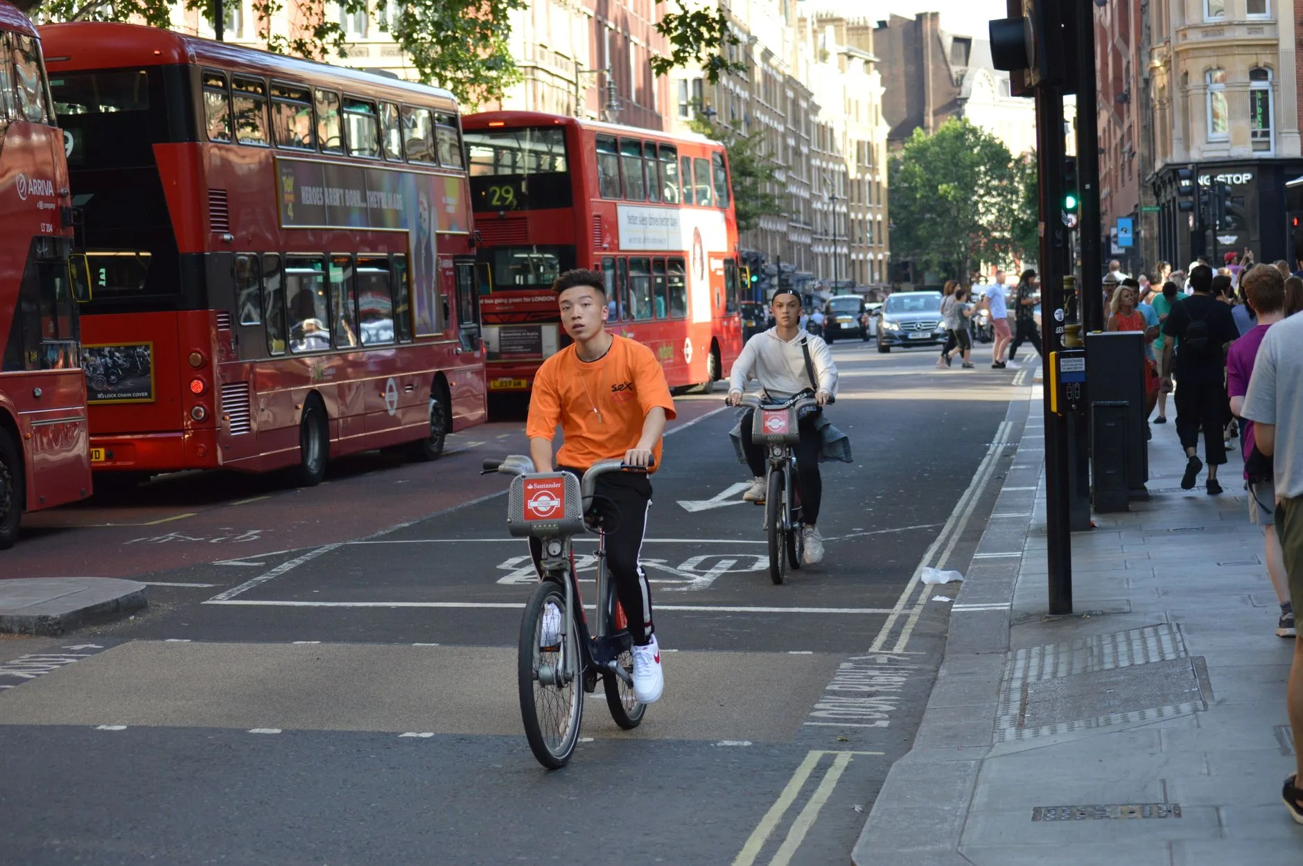 Cyclist using a London cycle lane on a relaxed e-bike route