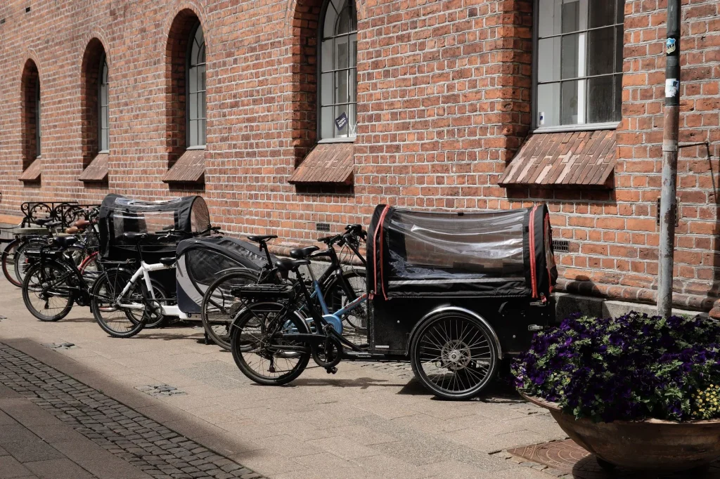 E-cargo bike used for family transport on a UK-style street
