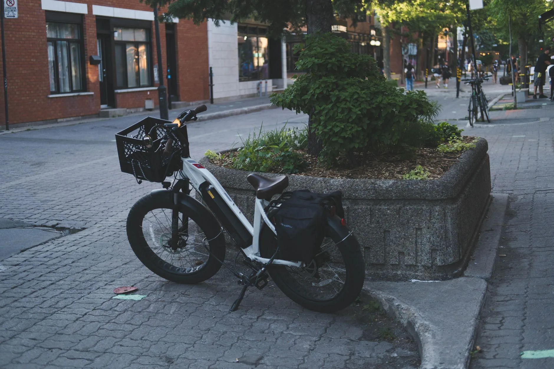 Hybrid e-bike with rack lights and mudguards for daily UK use