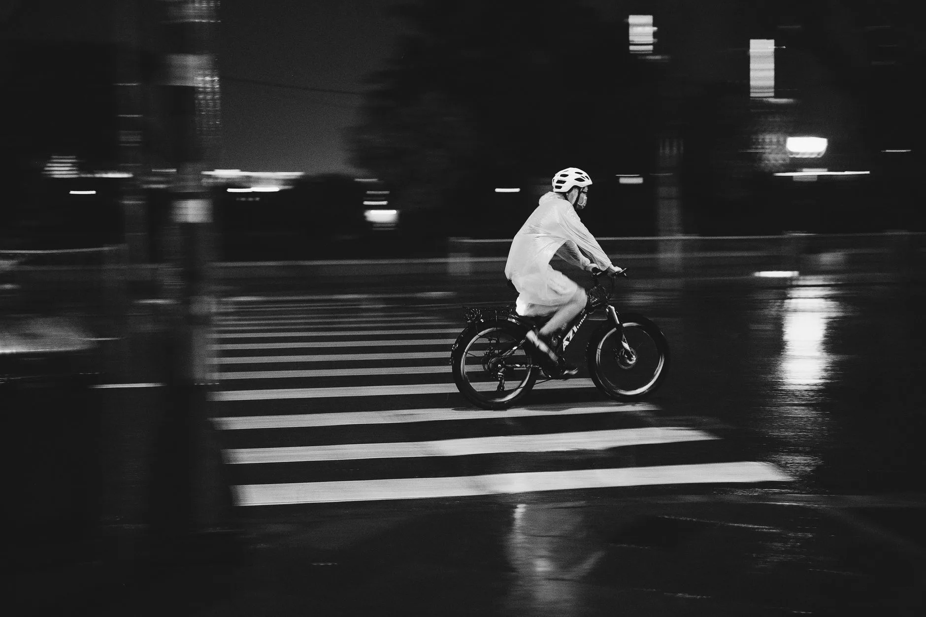 Reflective waterproof cycling jacket visible during a wet night commute