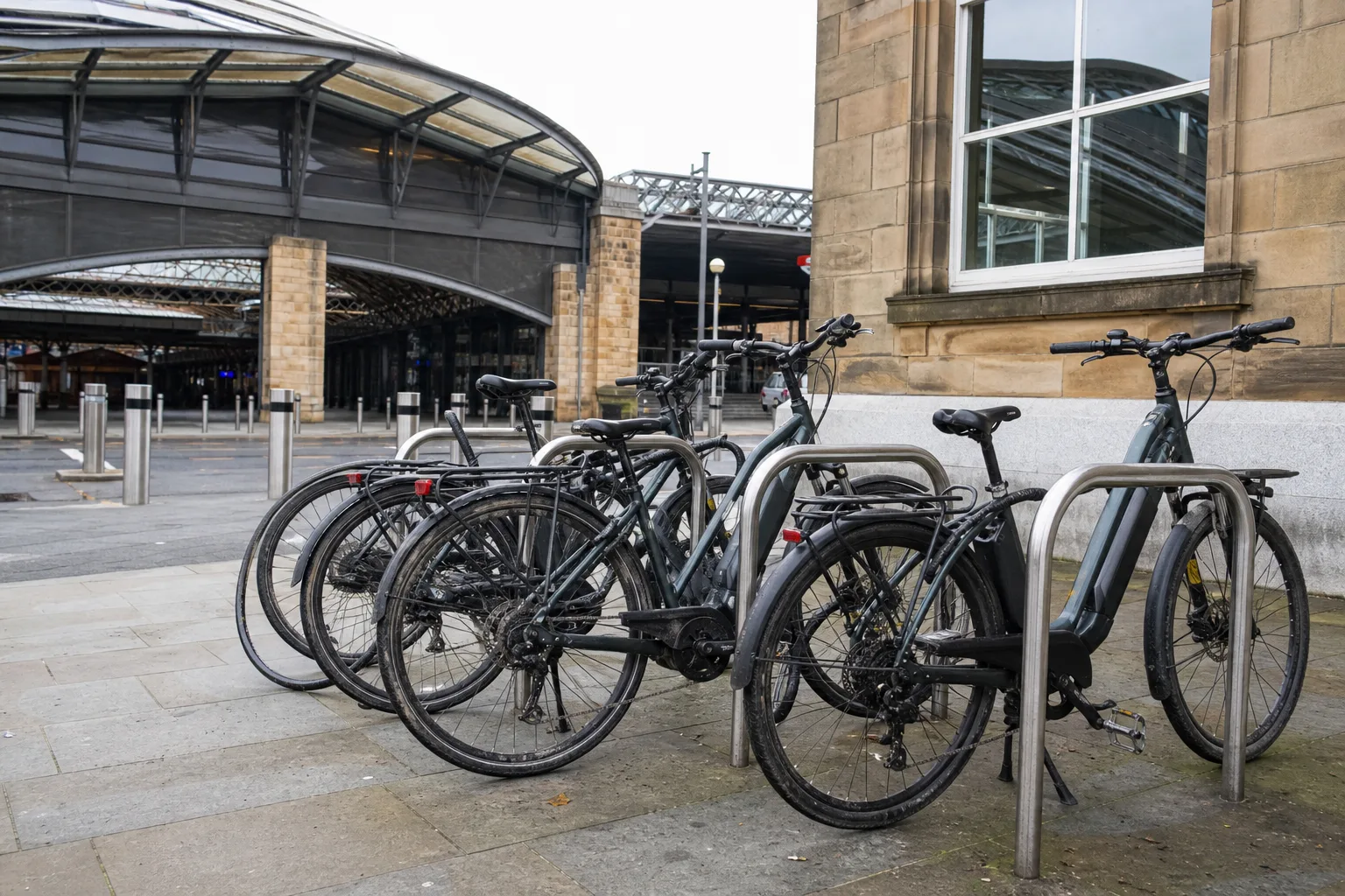 Secure e-bike parking at a busy UK commuter bike stand