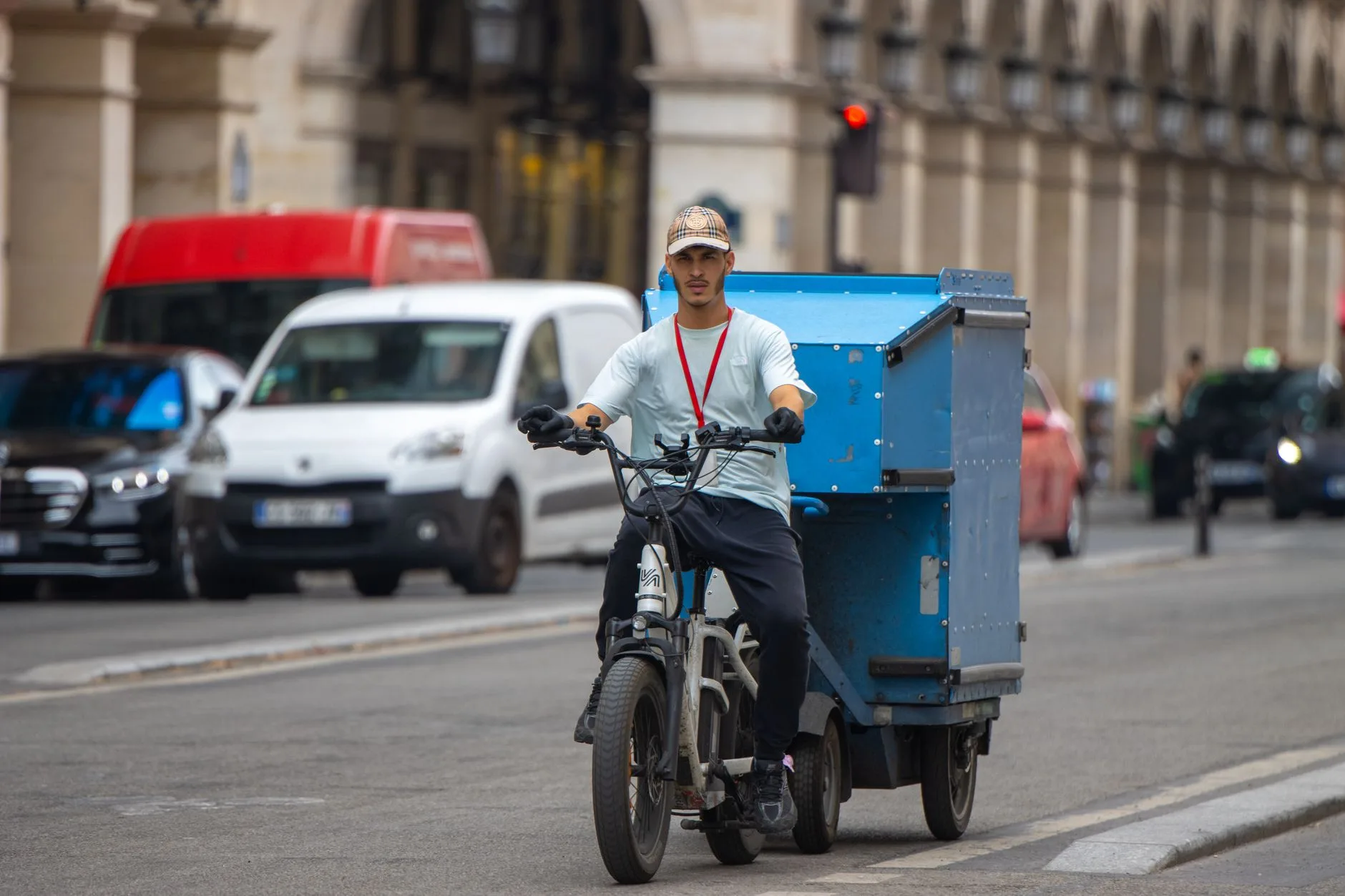 Electric cargo bike carrying a load on an urban journey